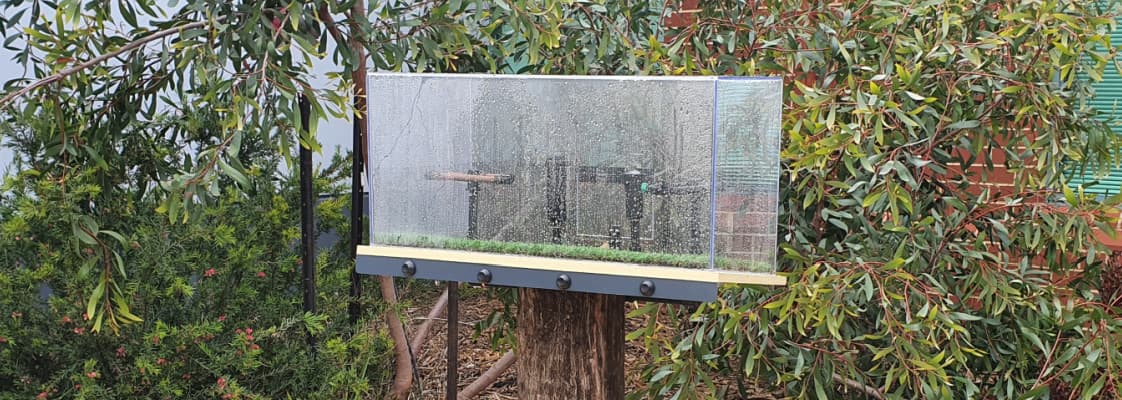 Irrigation demonstration station between plants.