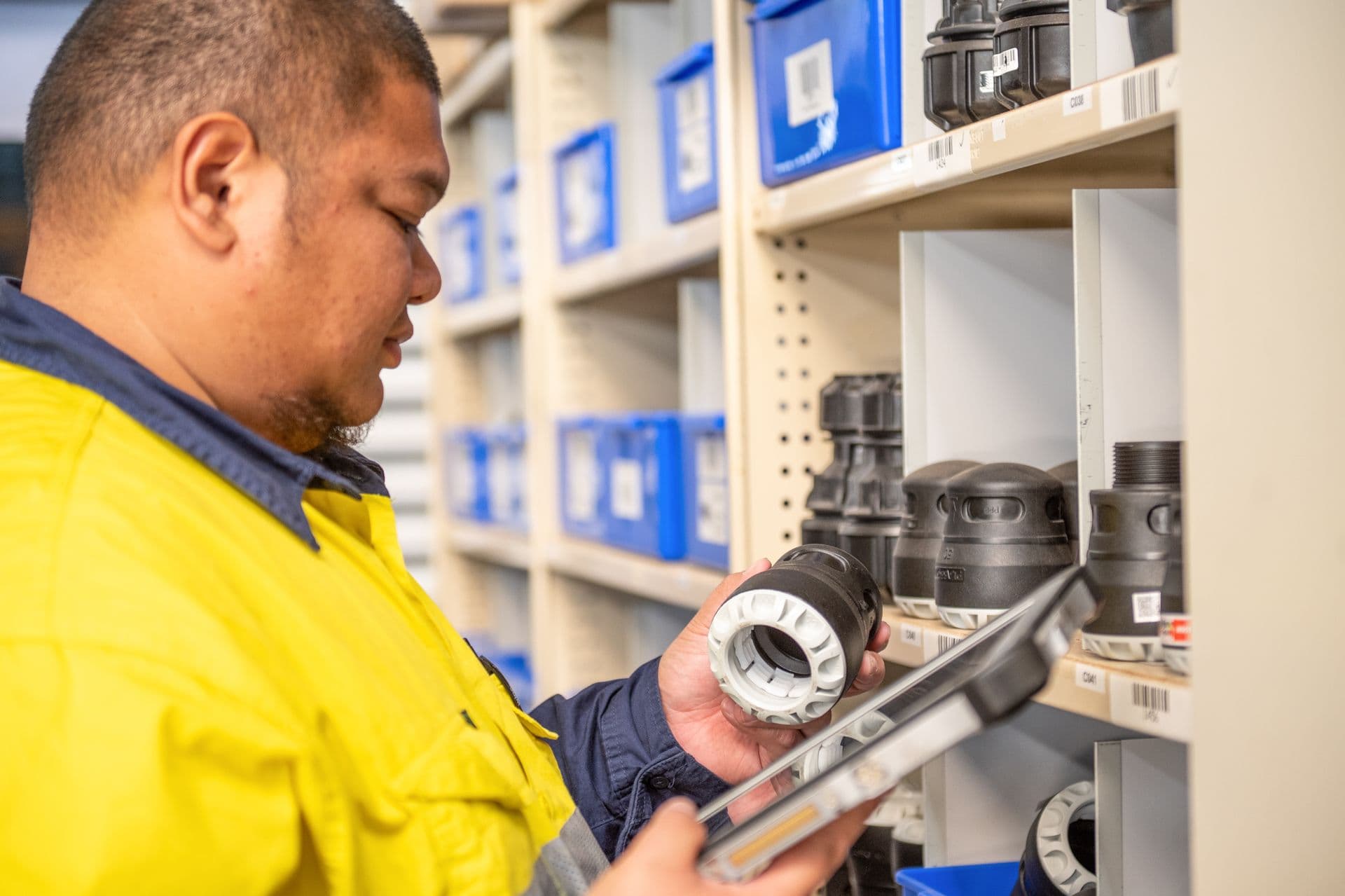 Man inspecting tool