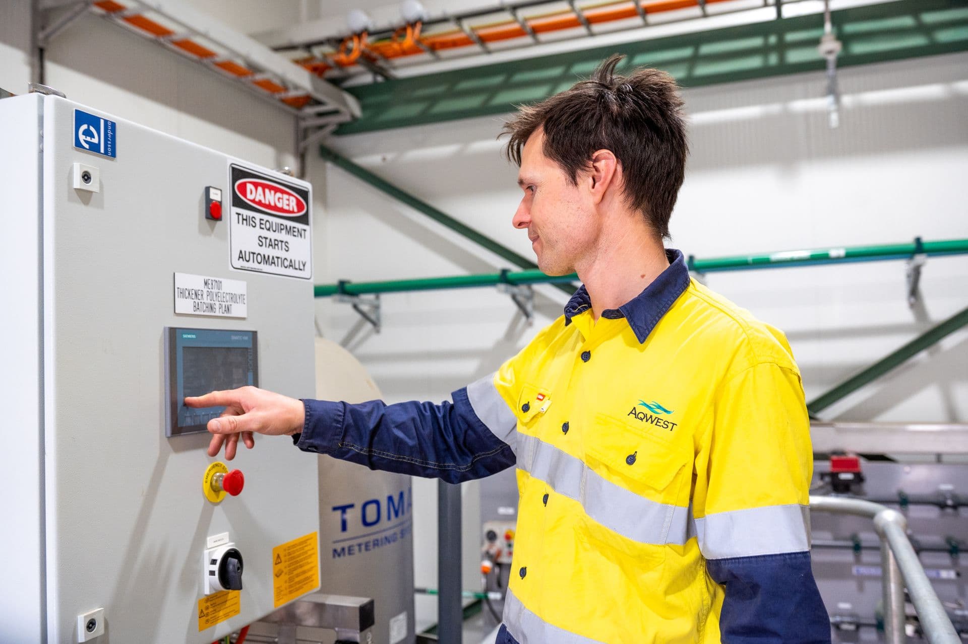 Man interacting with electrical box