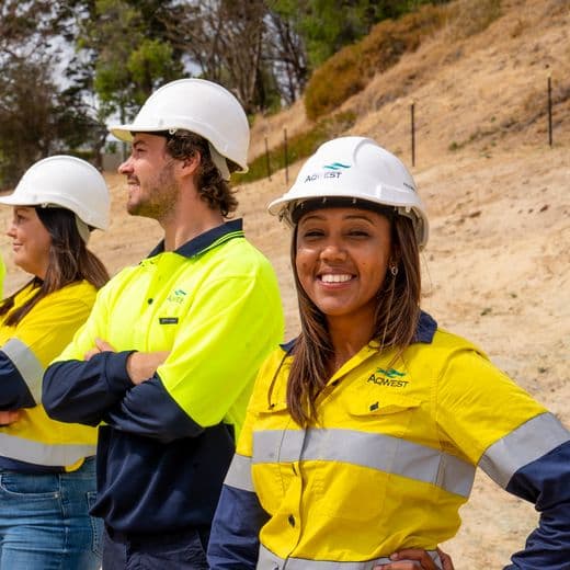 Aqwest staff standing in a row